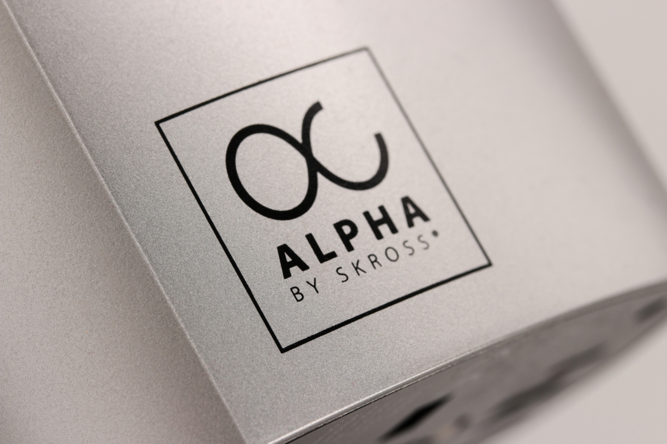 Alpha by SKROSS logo